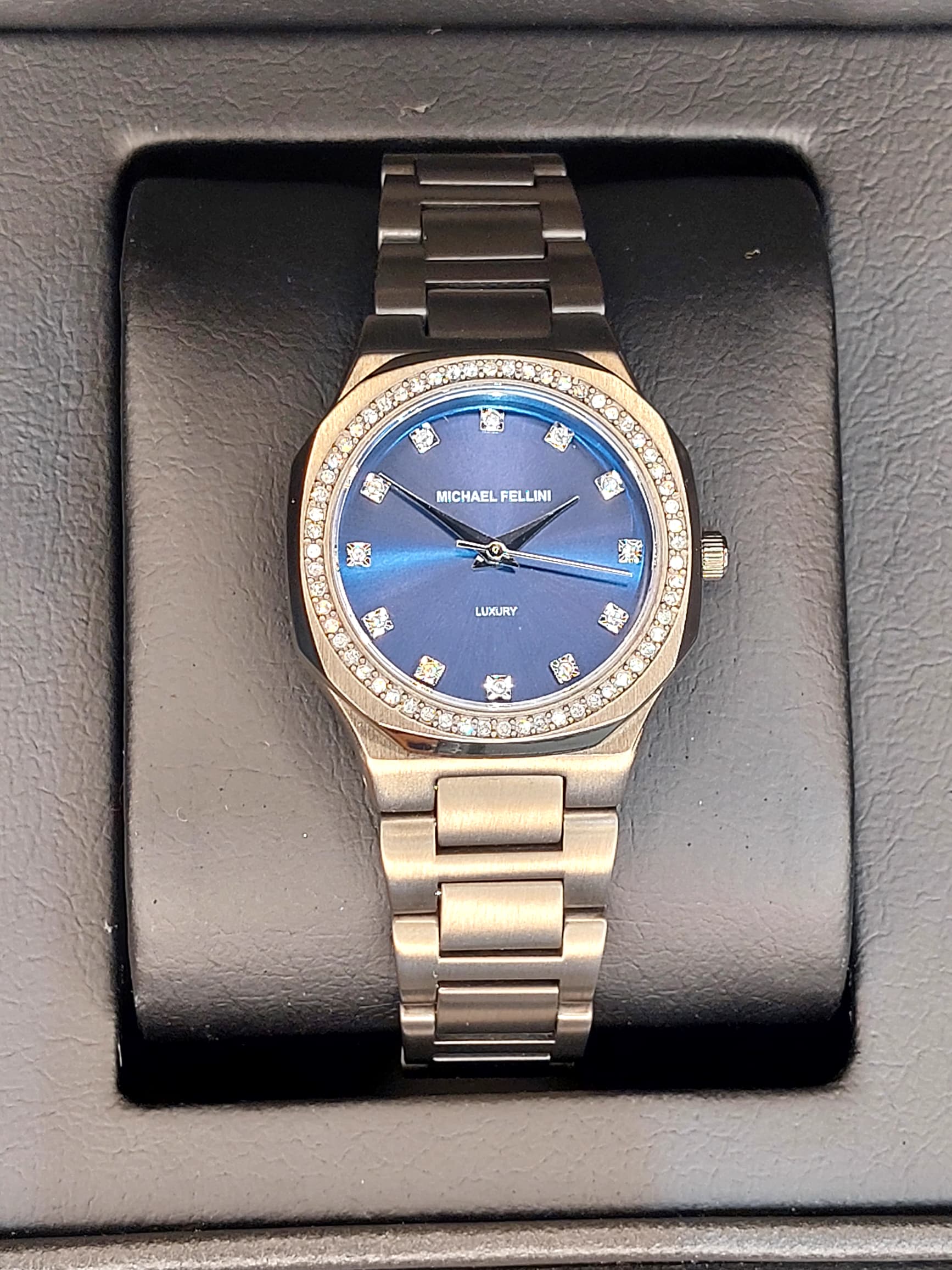 ساعت مجلسی زنانه برندMichael Fellini مدل NO-2450 آبی متالیک